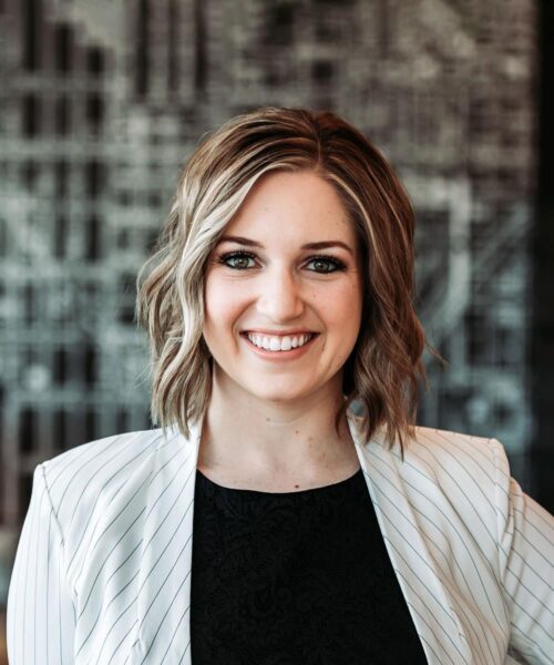 A Woman Smiling For The Camera