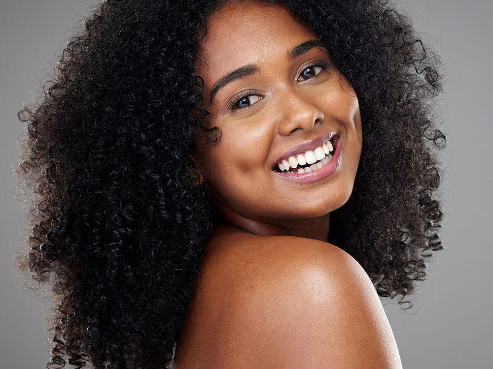 a woman smiling for the camera