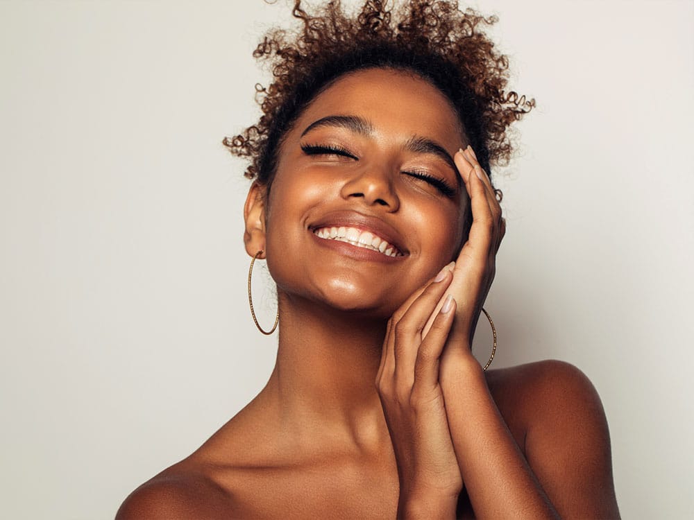 a woman smiling for the camera